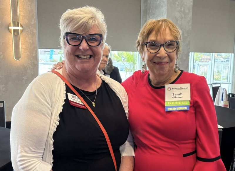 Pam McCutcheon of Community Bank Delaware, left, and Sarah Gilmour, FFW board member, share a smile during the Women’s Forum.